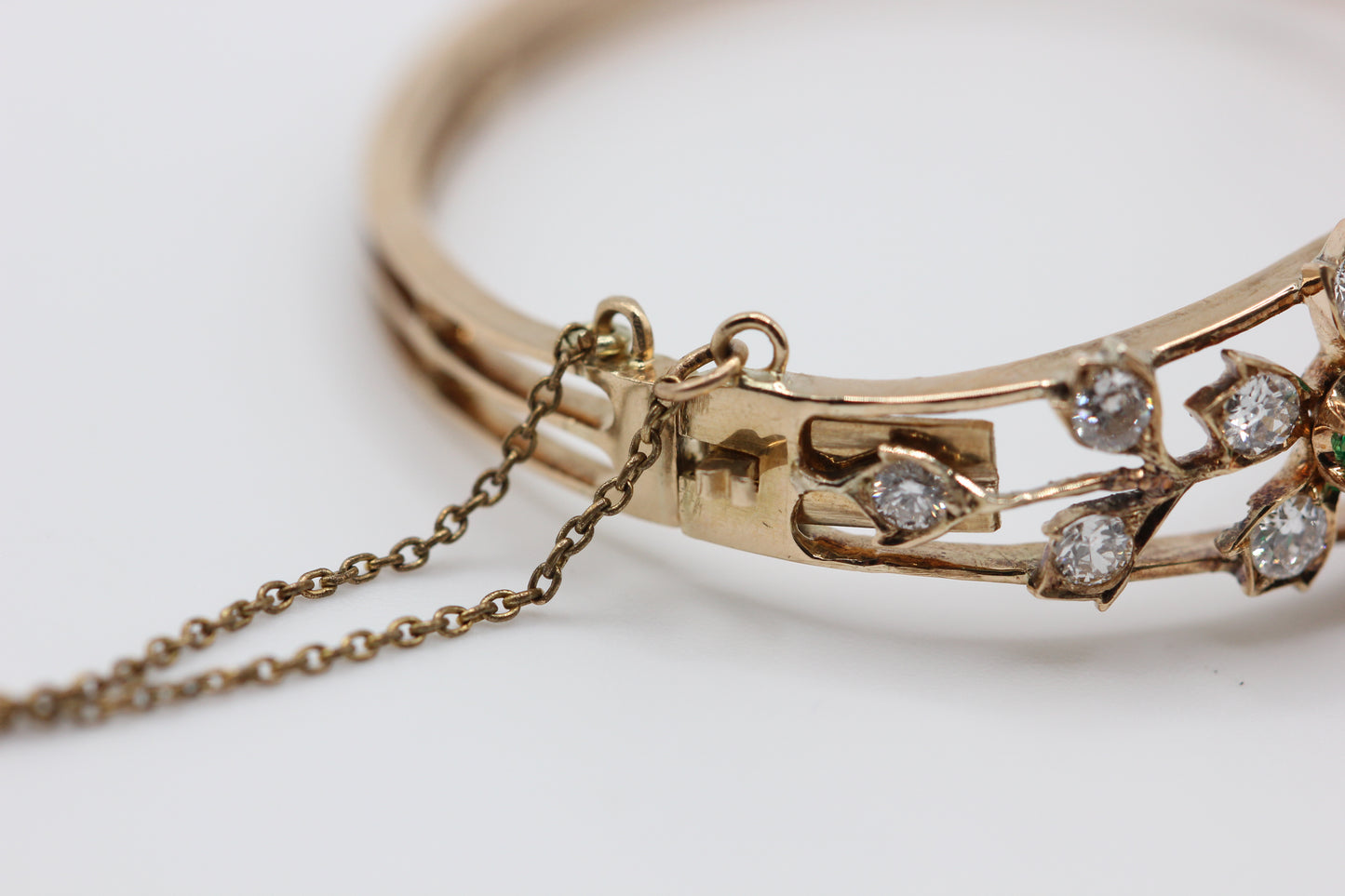 Diamond and emerald bangle
