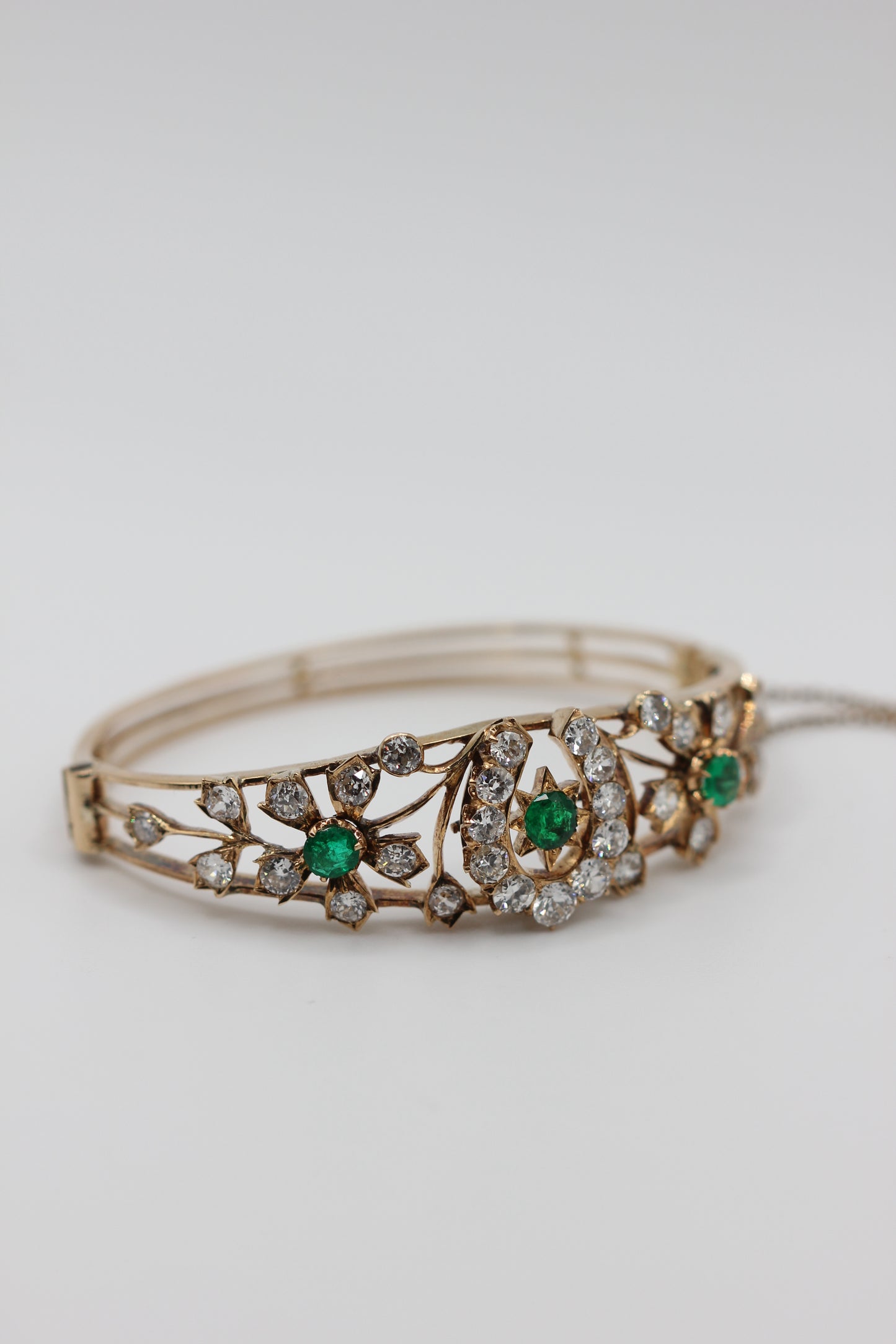 Diamond and emerald bangle