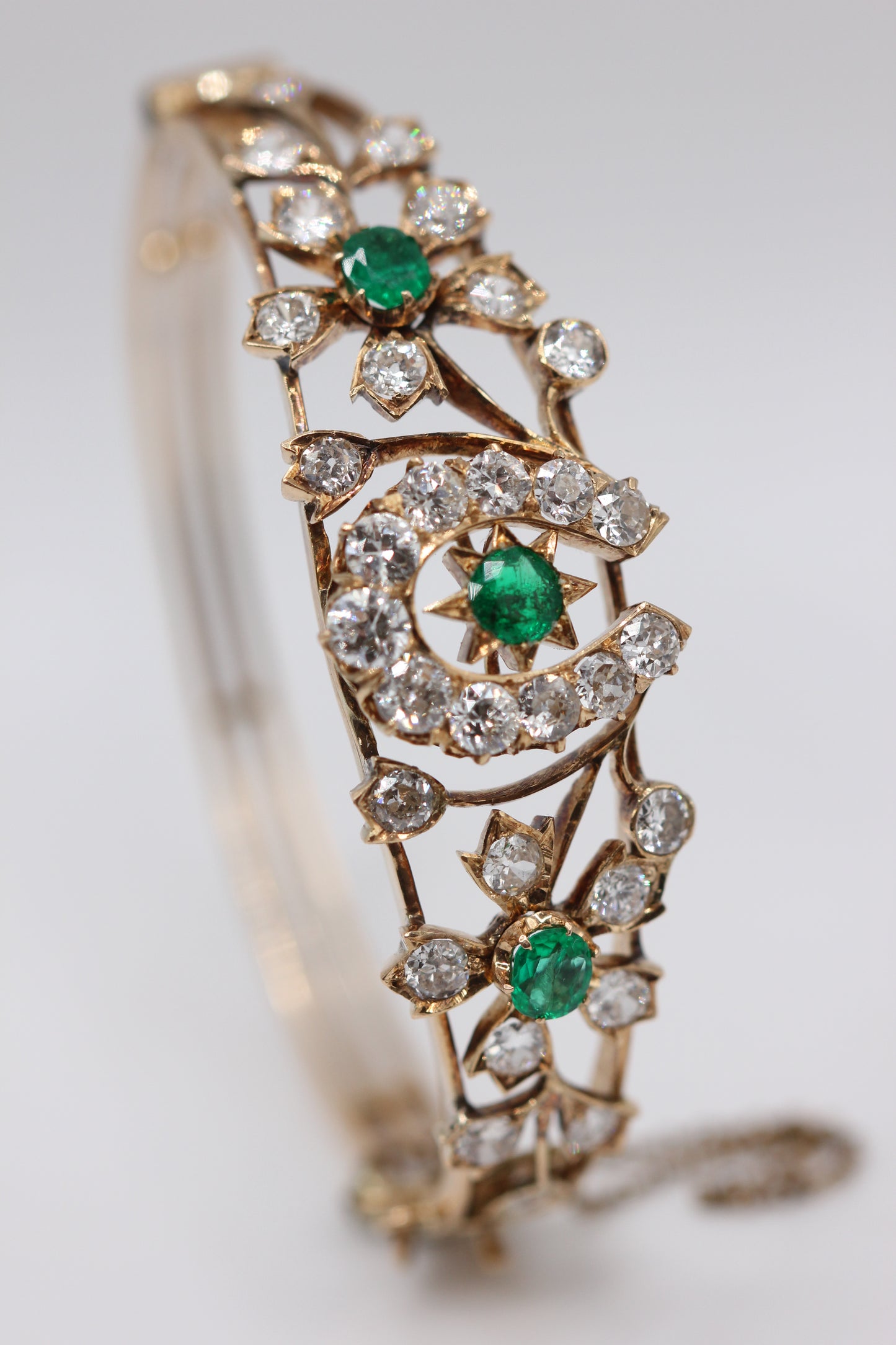 Diamond and emerald bangle