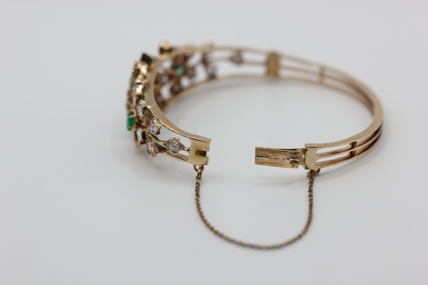Diamond and emerald bangle