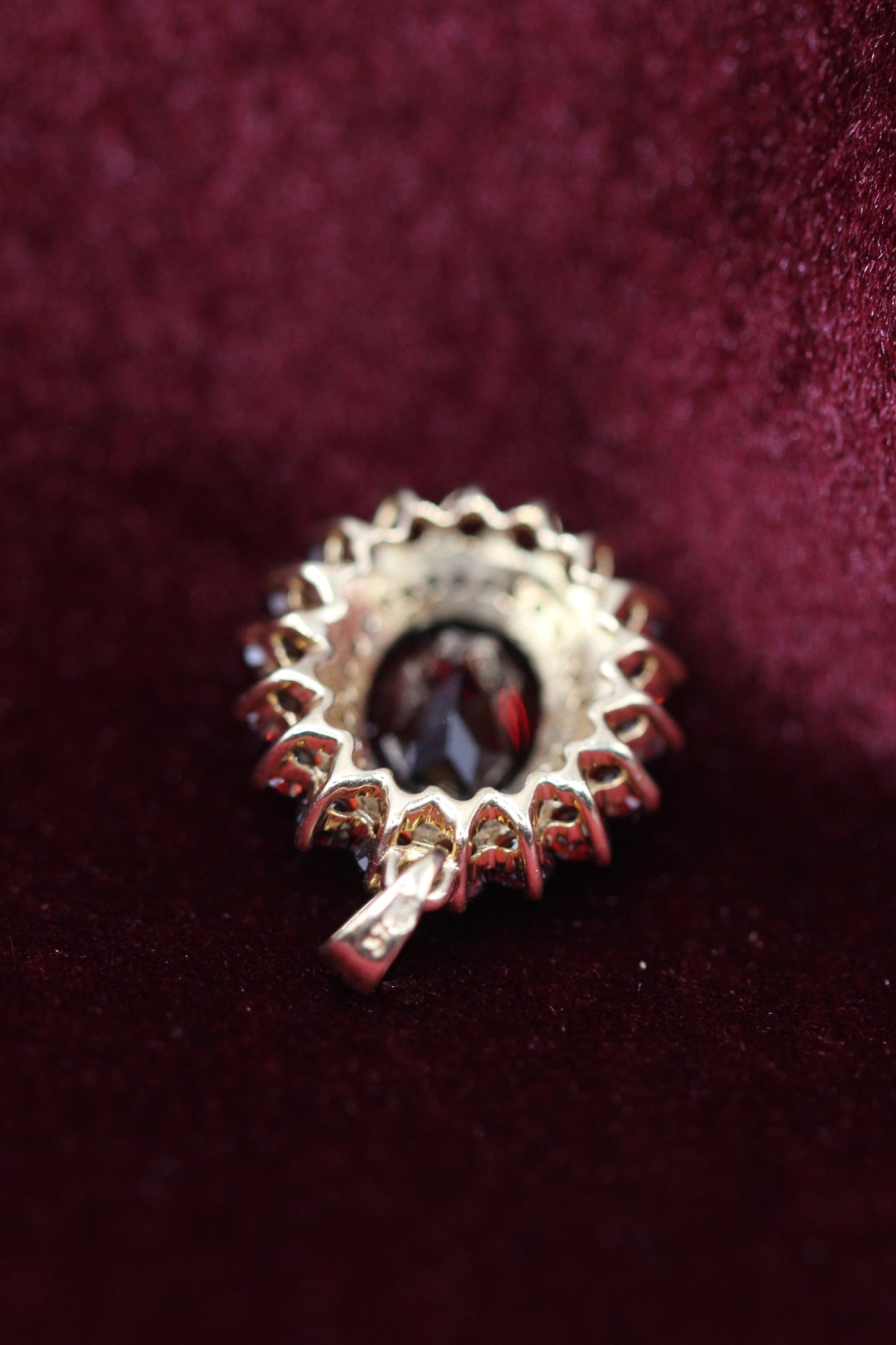 Garnet and diamond pendant