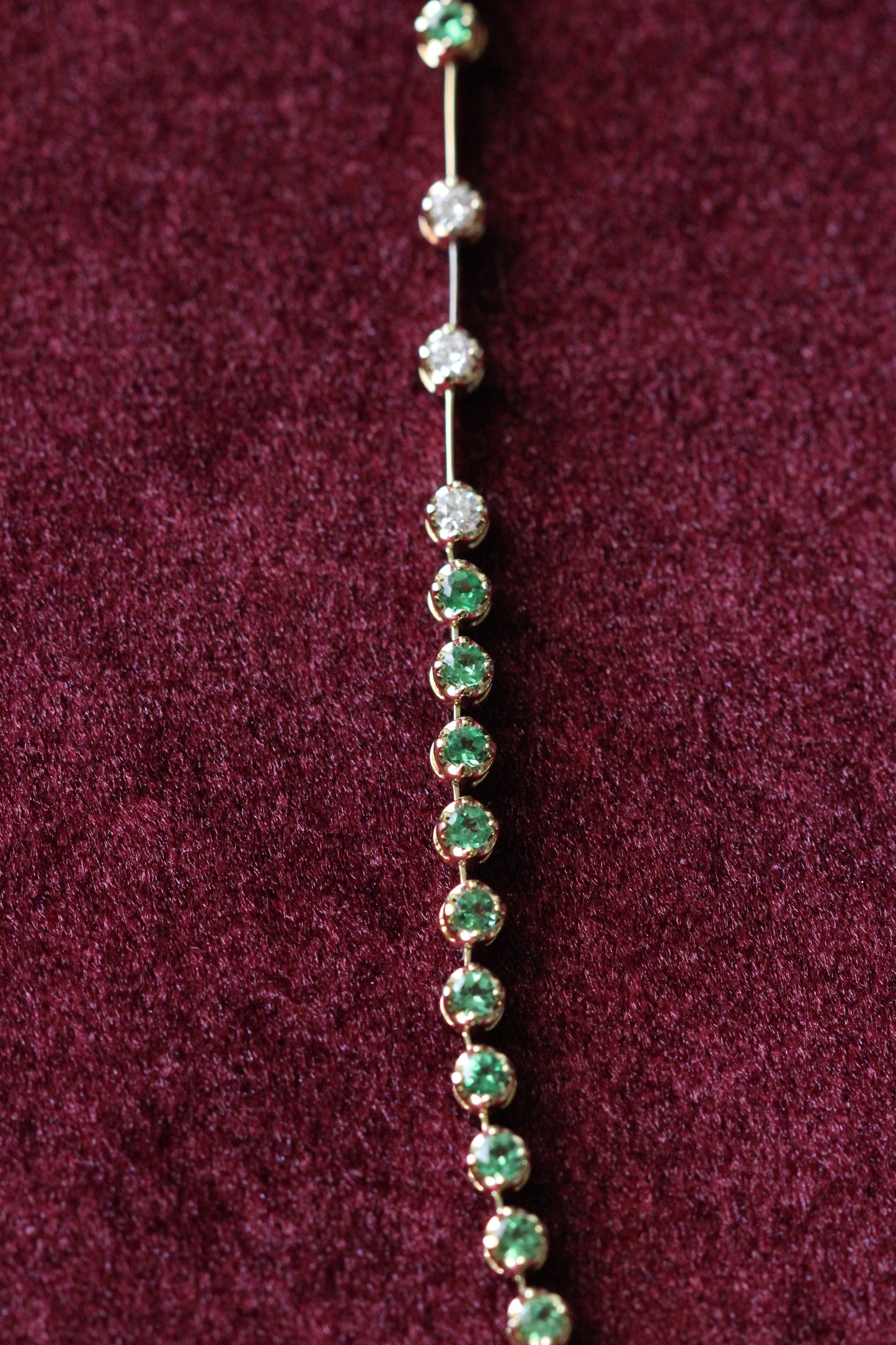 Emerald and diamond line necklace