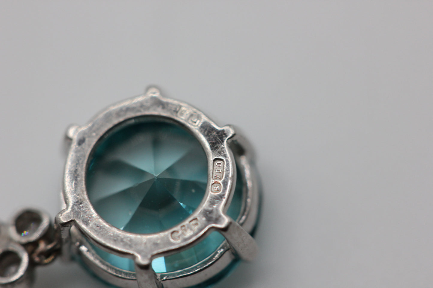 Zircon and diamond pendant