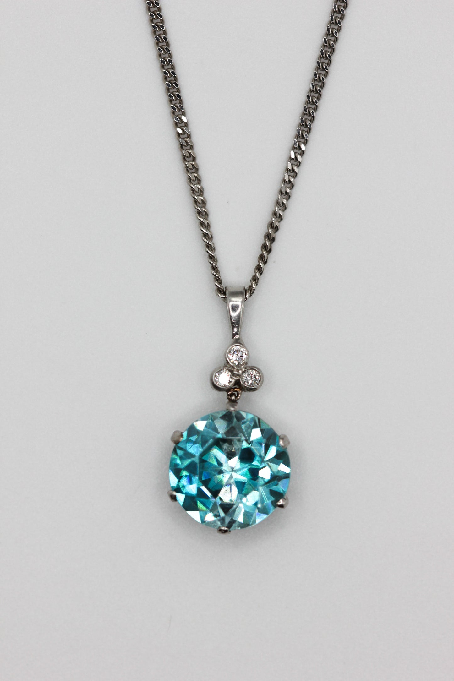 Zircon and diamond pendant