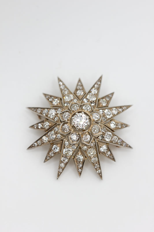 Star diamond brooch