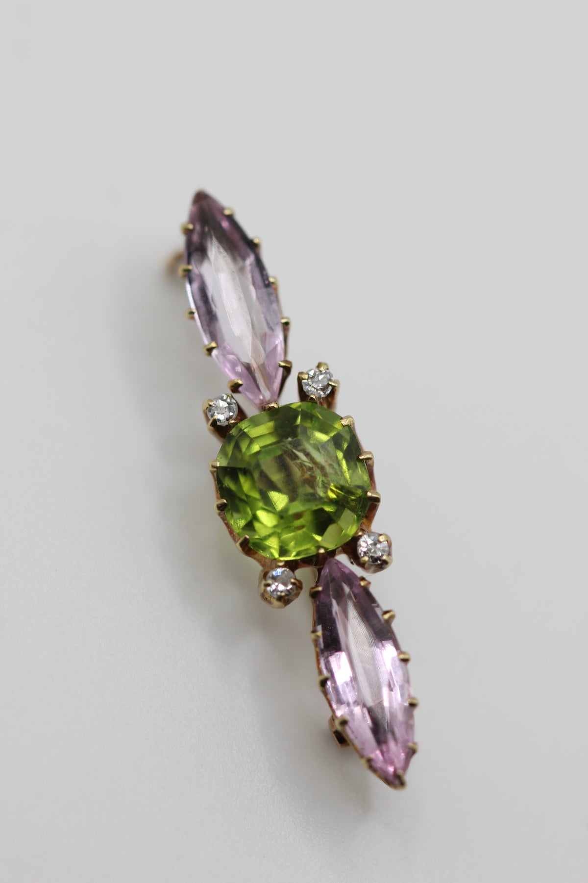 Pink topaz and peridot brooch