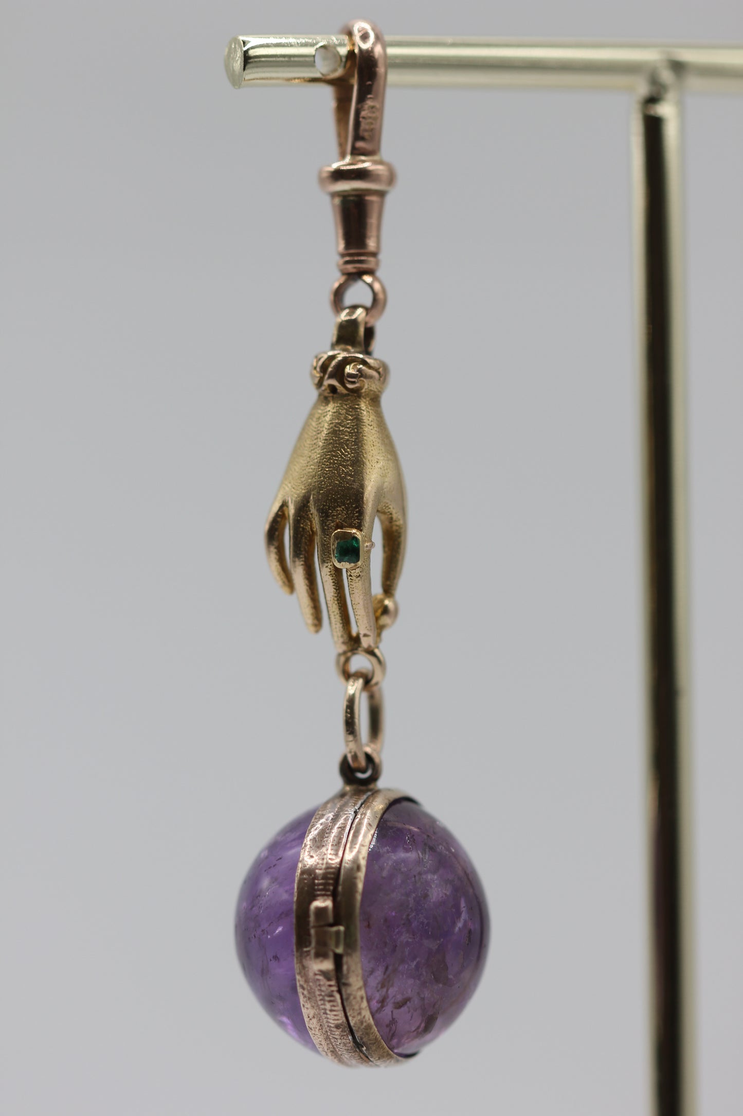 Gold hand pendant