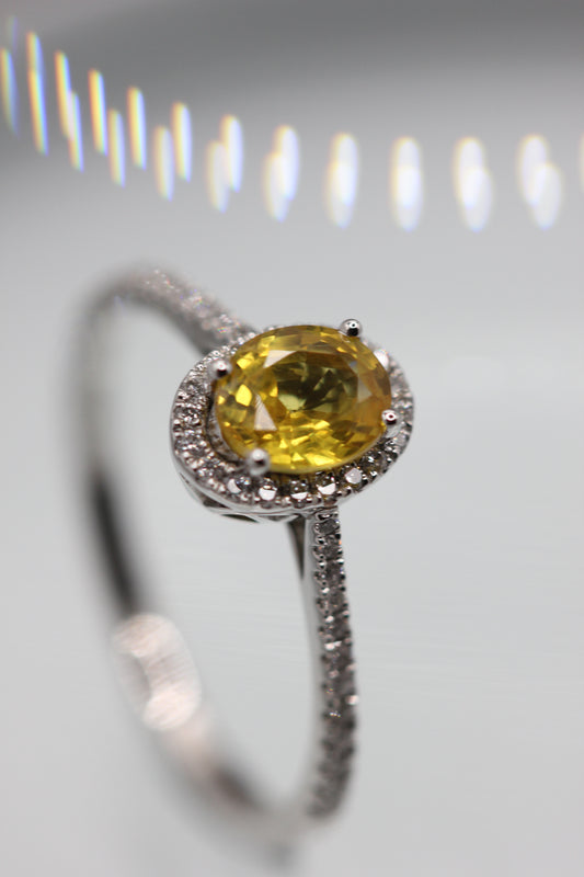 Yellow sapphire and diamond ring
