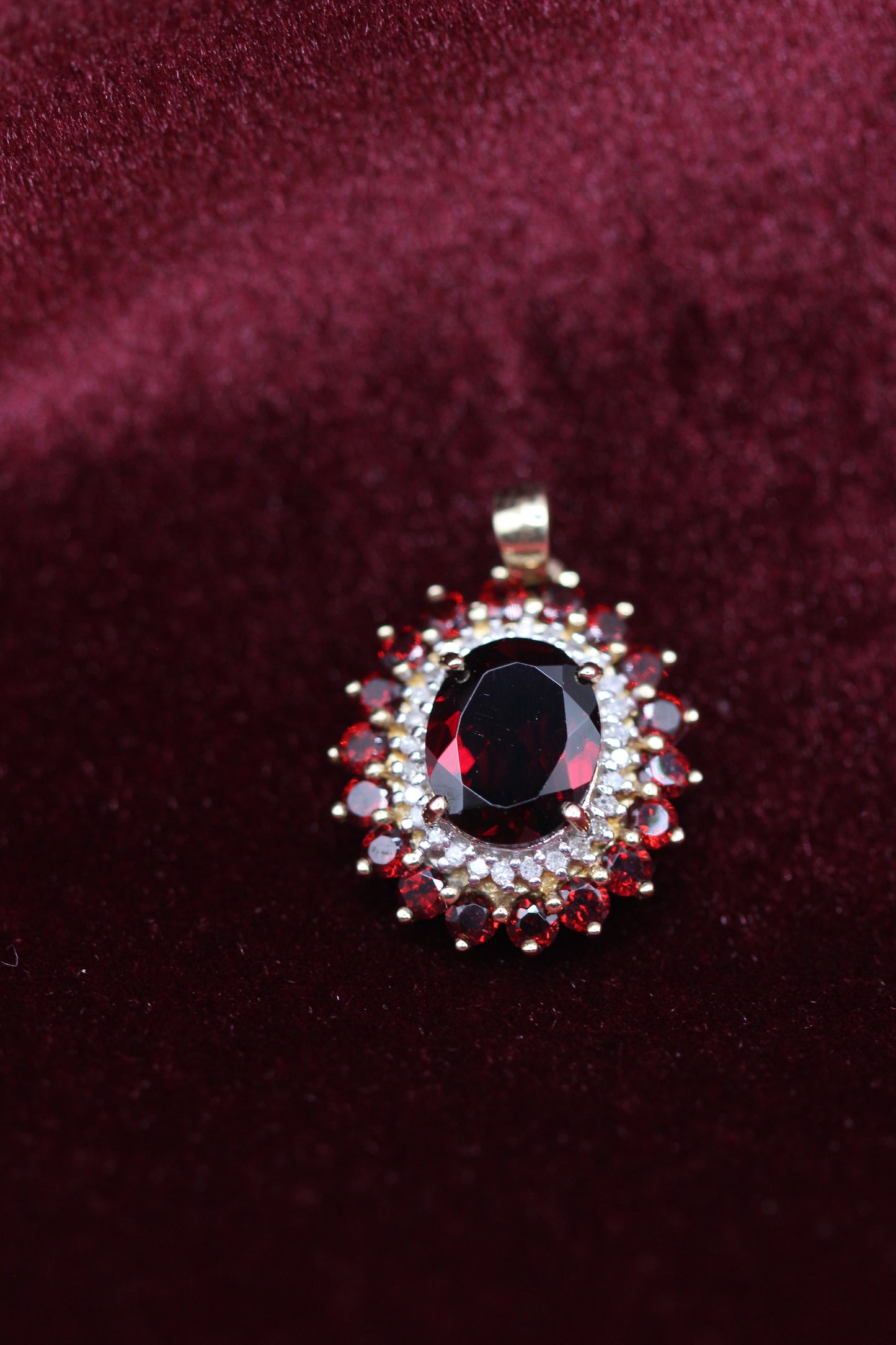Garnet and diamond pendant
