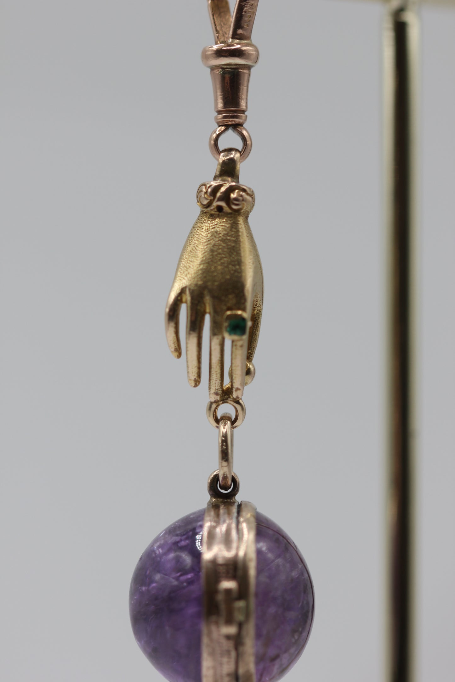 Gold hand pendant
