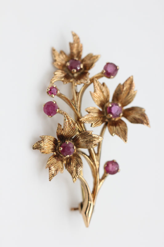 Gold flower brooch