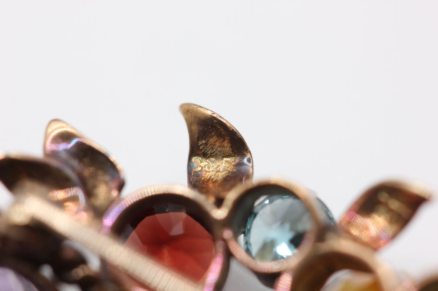 Multi gem flower basket brooch