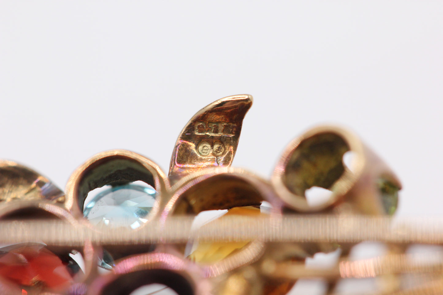 Multi gem flower basket brooch