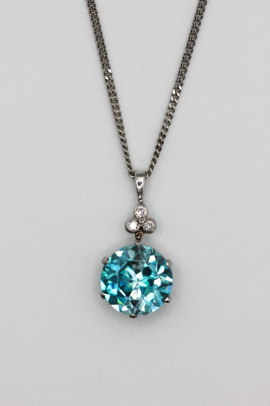 Zircon and diamond pendant