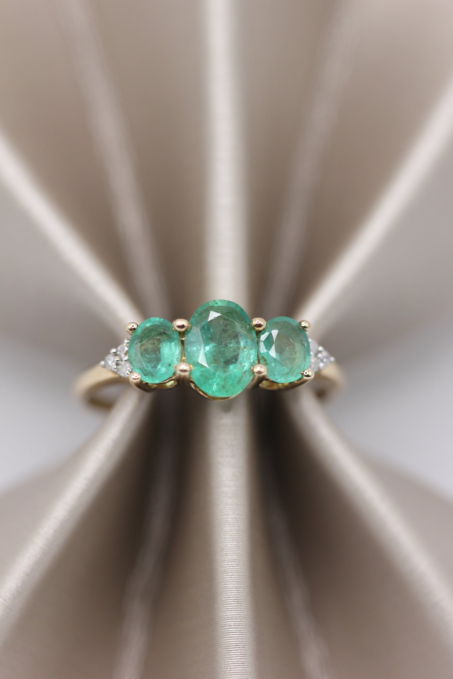 Three emeralds ring