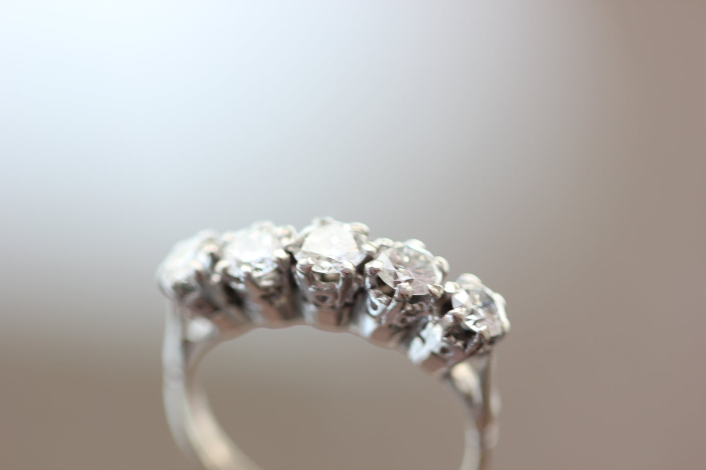 Five diamonds ring