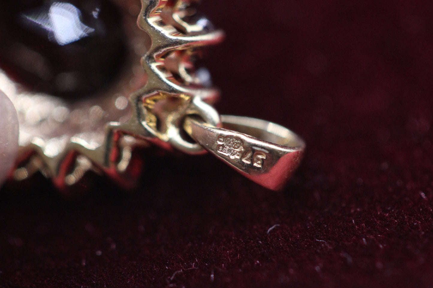 Garnet and diamond pendant
