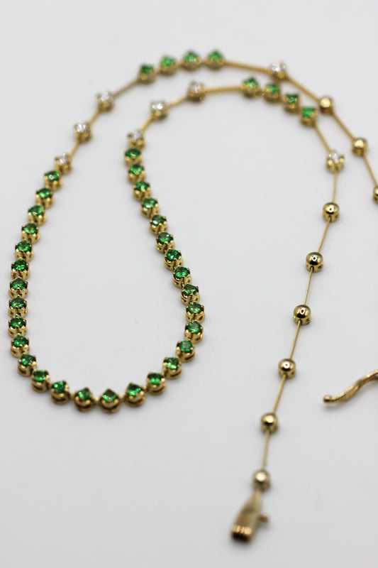 Emerald and diamond line necklace