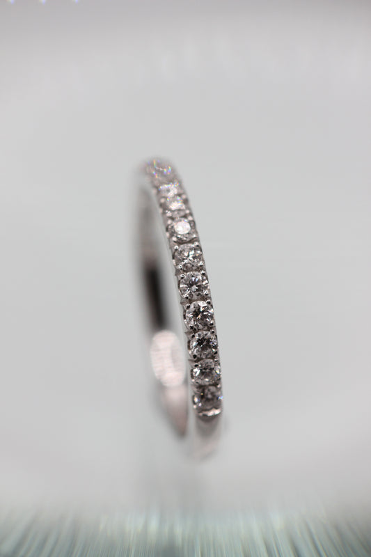 Diamond half eternity ring