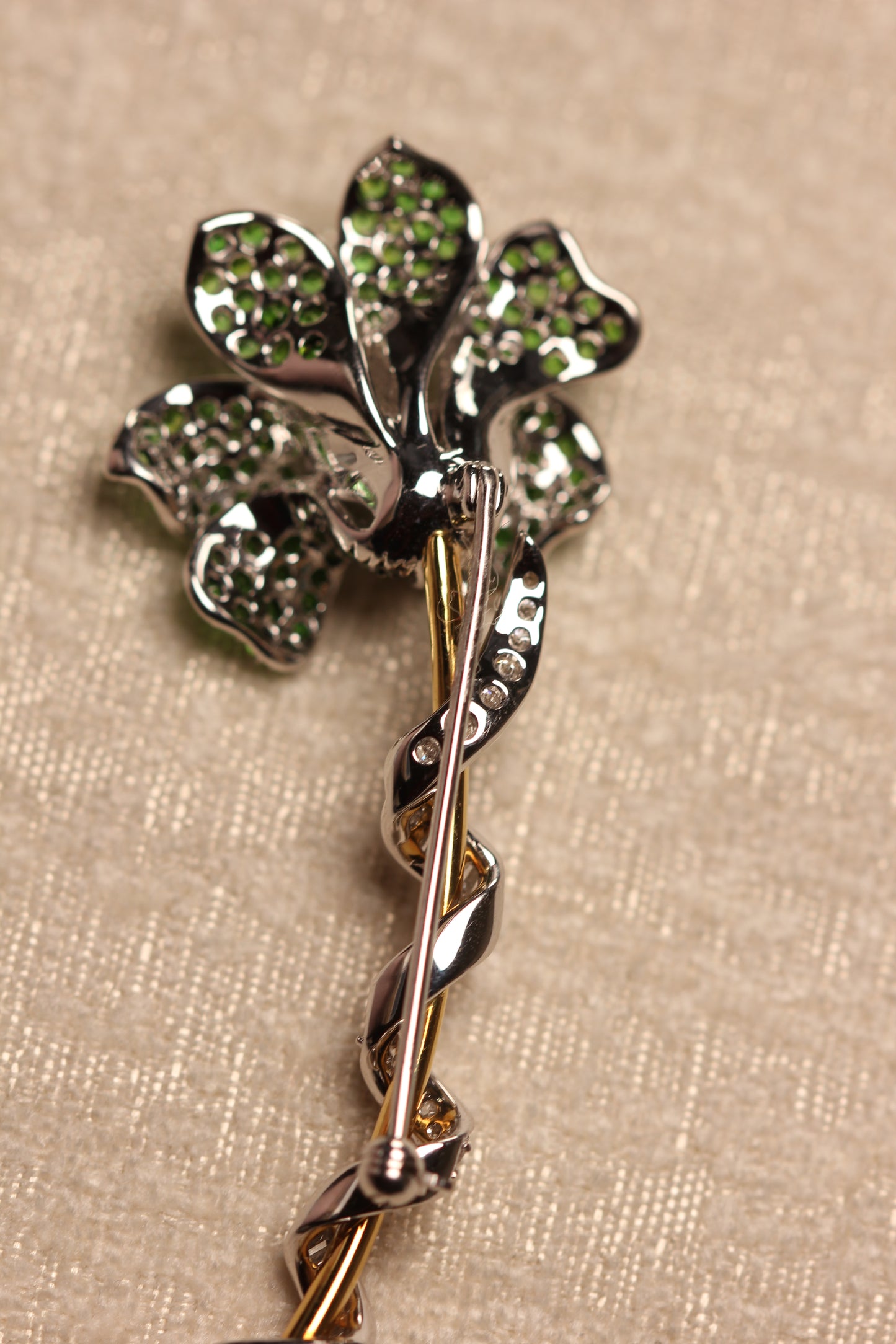 Tsavorite flower brooch