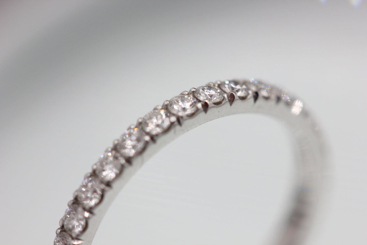 Diamond half eternity ring