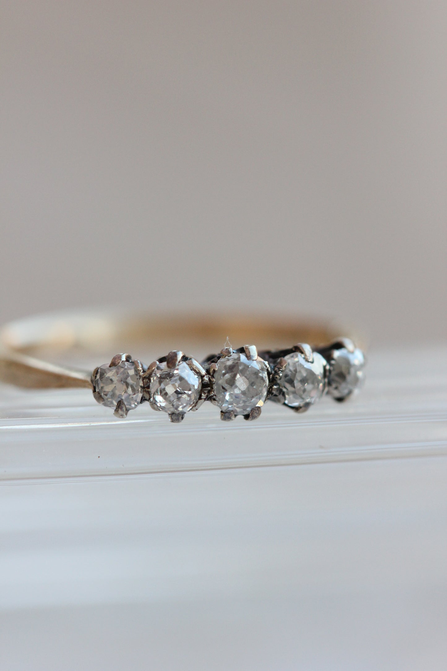 Old cut 5 diamonds ring